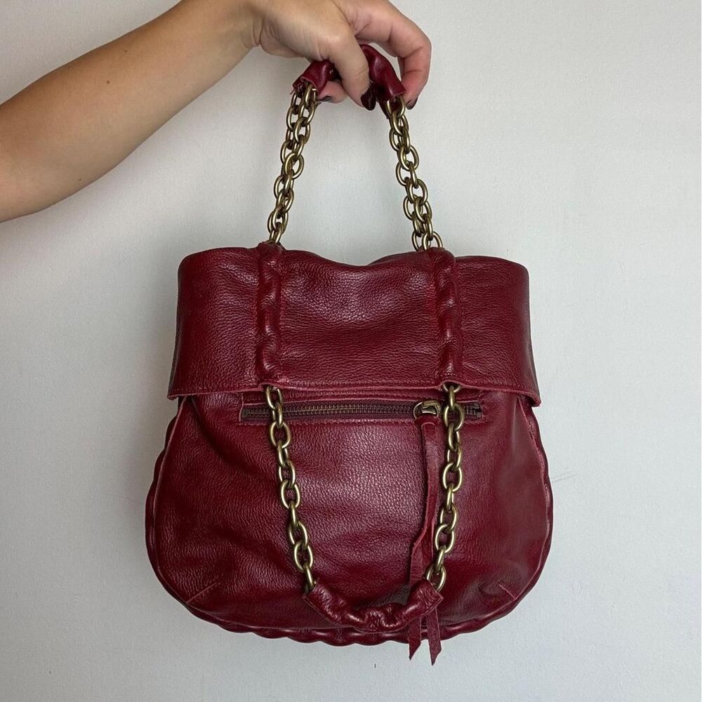 Foley & Corinna burgundy leather foldover mini bag with gold chain detail